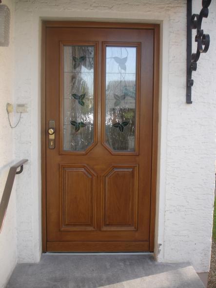 Holzhaustüre mit Bleiverglasung grüne Blätter